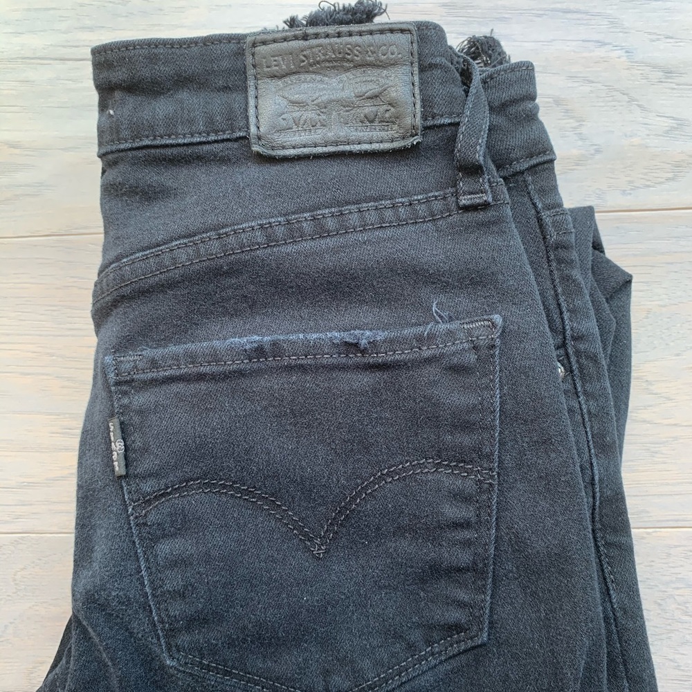 levis high rise ripped skinny jeans